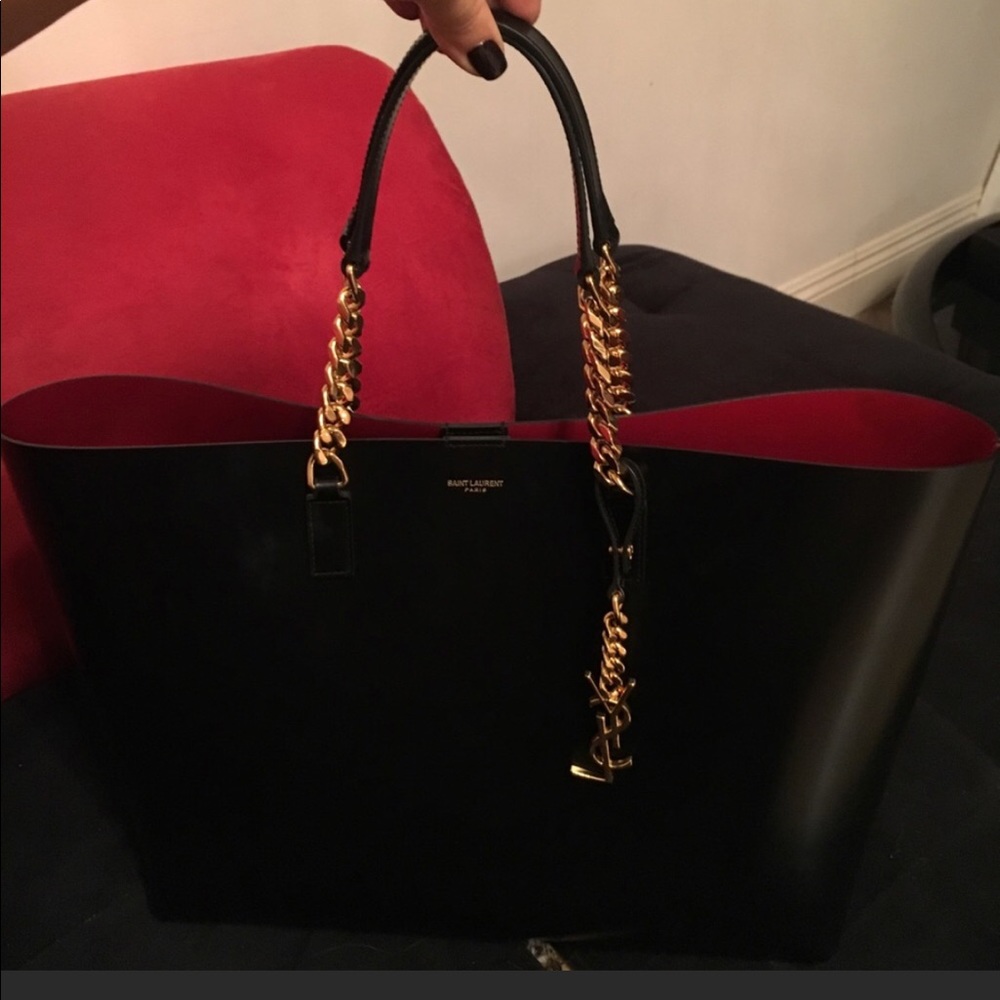 Saint Laurent structured tote, with gold chain detail.